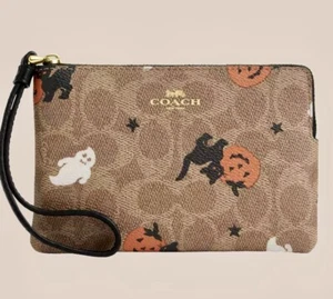 Muñequera COACH Esquina Cremallera Firma Lienzo Halloween Impresión Fantasma Gato NUEVO LIMITADO - Imagen 1 de 3