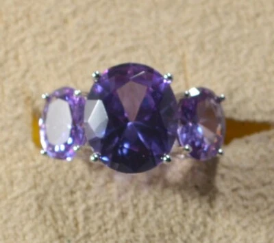 PURPLE  COLOR-CHANGE SAPPHIRE (LAB)  3-STONE TRILOGY-SZ 6 RING-RHOD/STER SIL - Image 1 of 4
