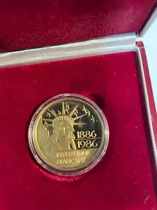 Gold Münze 920 100 F 17 g 1986 Monnaie de Paris 100 FRANCS OR STATUE OF LIBERTY - Bild 1 von 6