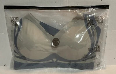 Nuevo sujetador antigravedad sin costuras XL para mujer 2 tonos gris topo Foto 1 de 4