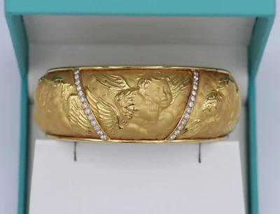 Brazalete Brazalete Querubín Ángel Diamante Carrera Y Carrera Oro Amarillo 18K Foto 1 de 4