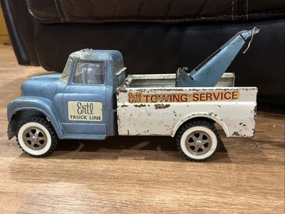 Línea de camiones de servicio de remolque Ertl Loadstar de colección COLOR RARO, grúa, azul Foto 1 de 4
