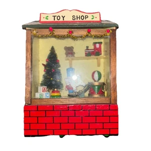 Toy Shop Musical Light Weihnachten auf der ganzen Welt spielt das Hündchen im Fenster - Bild 1 von 3