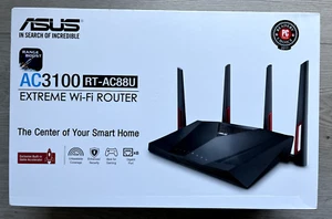 ASUS RT-AC88U Dual-Band Wi-Fi Router and ASUS RP-AC1900 WiFi Range Extender - Picture 1 of 6