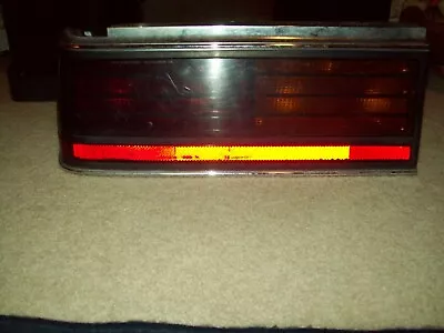original equipment 1982 1983 pontiac 6000 ste four door left hand tail light - Image 1 of 4