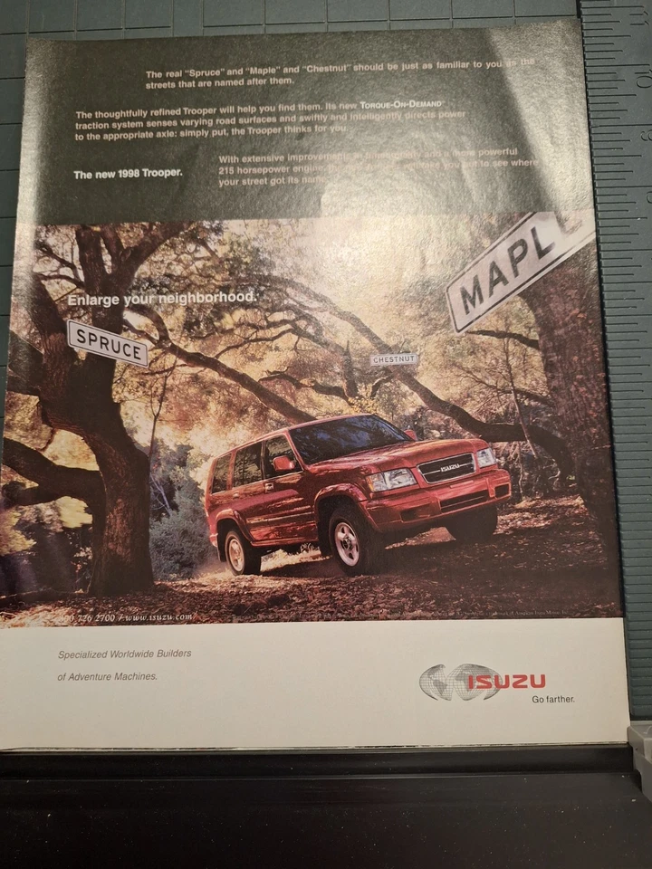 Anuncio de colección 1997 Isuzu Trooper anuncio rojo SUV bosques forestales Foto 1 de 1