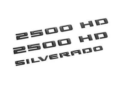 Chevrolet Silverado 2500HD 2020-2026 carrocería lateral negro emblema kit 86539794 OEM GM Foto 1 de 4