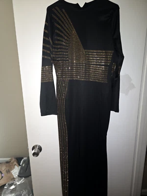 vestido largo negro y dorado. Talla extra grande.nuevo estado  Foto 1 de 3