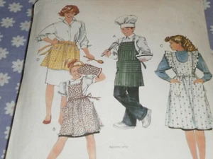 McCALL'S 9383 MISSES MEN'S & CHILD'S BIB & HALF APRONS PATTERN-UNCUT - Picture 1 of 3