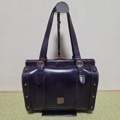 Sac à main ANNA SUI avec fermeture à fermoir, sac de médecin, cuir violet - Photo 1/4