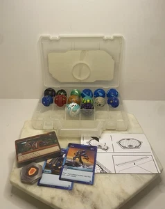 Bakugan Battle Set - Clear Case with 14 figures and Sealed Cards - Bild 1 von 6
