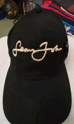 Gorra Sean John con logotipo de escritura bordado ajustable por American Cap EE. UU. Foto 1 de 4