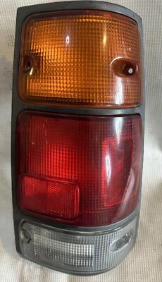1994 ISUZU RODEO RH TAIL LIGHT BLACK TRIM USED OEM - Image 1 of 4