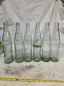 Coca Cola Gläser Flaschen. 16oz. 6 Stück. Muss gereinigt werden. Könnte einige Chips haben. - Bild 1 von 11