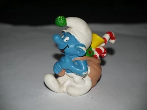 PEYO FIGURINE SCHTROUMPF AVEC HOTTE DE JOUETS 1981 - Bild 1 von 3