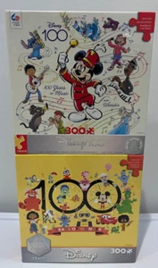 JUEGO DE 2 rompecabezas Ceaco 300 piezas ~ 100 años de maravilla y 100 años de música - Imagen 1 de 3