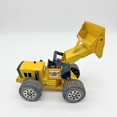 Cargador frontal de acero prensado Tonka de colección de los años 70 52900 piedras cantera de grava amarillo Foto 1 de 4