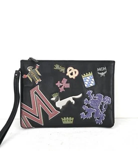 MCM zippered leather clutch in black - Bild 1 von 13
