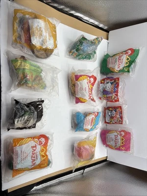 Лот из 12 90-х/2000-х McDonald's игрушки новый Tonka/Tarzan/Snoopy/Lion King - Изображение 1 из 4