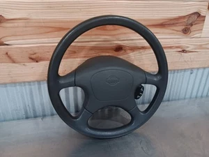 94-95 Nissan Hardbody D21 OEM volante gris poco kilometraje - Imagen 1 de 5