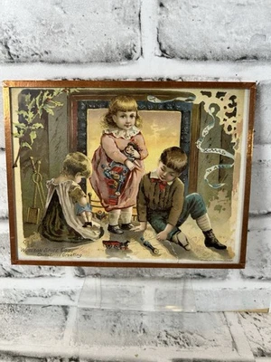 Tarjeta de Navidad/comercialización victoriana de la década de 1890 en anuncio de vidrio prensado Foto 1 de 4