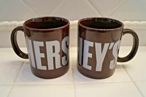 LOTTO 2 PAIA DI TAZZINE DA CAFFÈ HERHEY'S DAL 1894 MARRONI NUOVE - Foto 1 di 4