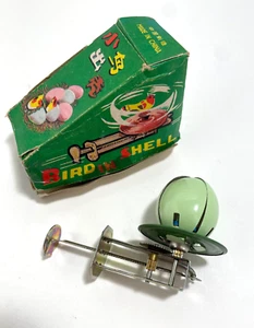 Uovo di Pasqua vintage anni 60 uccellino in conchiglia giocattolo rotante MS855 con scatola - Foto 1 di 8