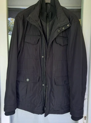 Tief-Schwarze Herren Winterjacke  Gr. XL , Taille 130 cm,Armbund,  kaum getragen - Bild 1 von 4