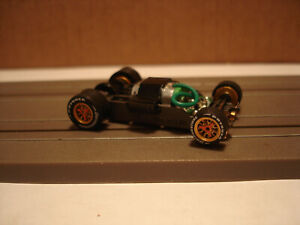 TOMY AFX H.O. SCALE MEGA G+ 1.5 WIDE CHASSIS GOLD SPOKED BRIDGESTONE TIRES