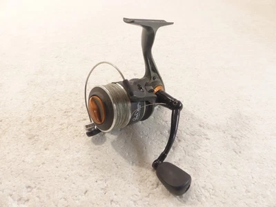 Carrete giratorio de 4 bolas Bass Pro Shops Quantum 20 Bill Dance SE 5,2:1 cara abierta Foto 1 de 4