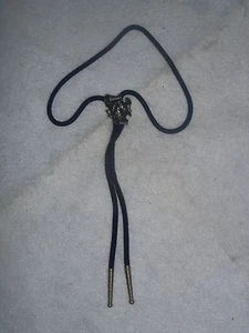 Vintage Swank Bolo Tie Heraldic Style Metal Horse Head Slide with Black Cording - Picture 1 of 2
