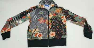 Chaqueta de pista Adidas para mujer Jardim Agharta Farm Firebird Trefoil talla grande Foto 1 de 4
