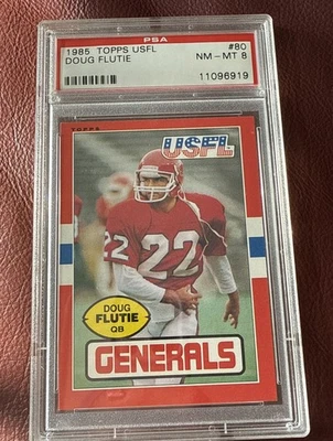 1985 Topps USFL #80 Doug Flutie PSA 8 NM-MT - Image 1 of 2
