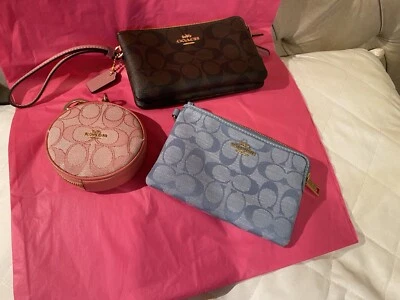 Las 3 bolsas de monedas Coach. Foto 1 de 4
