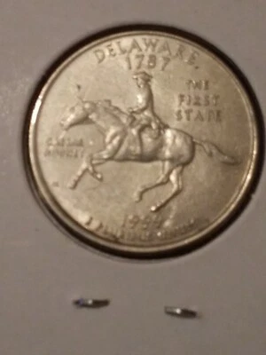 Error coin Spitting Horse Rare 1999 P Delaware State Quarter (Regular Strike)  - Image 1 of 4