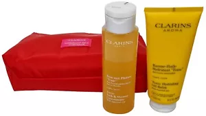 Bolsa de artículos de tocador CLARINS tónico concentrado tónico bálsamo de aceite para baño y ducha - Imagen 1 de 6