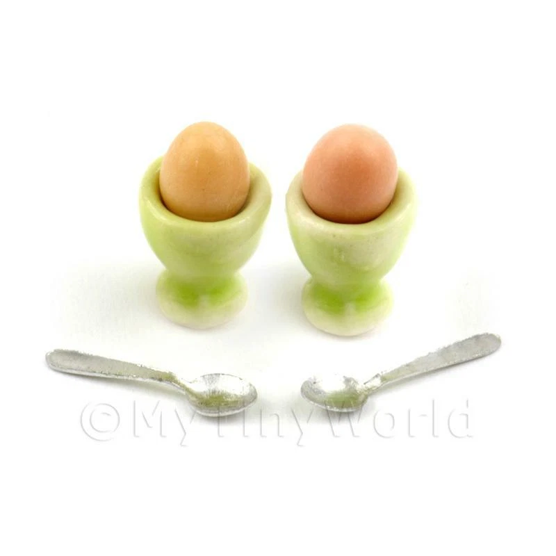 2 Dolls House Miniature Eggs in Green Ceramic Egg Cups With Spoons - Image 1 of 1