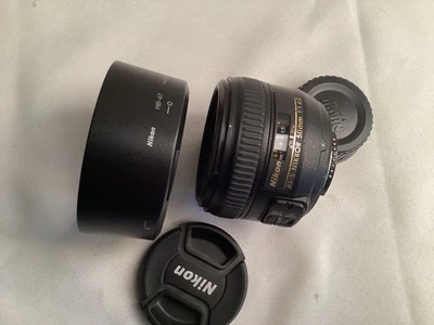 Lente estándar Nikon AF-S FX NIKKOR 50 mm F/1,4G + parasol Foto 1 de 4