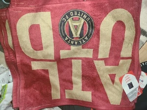 Atlanta United Rally Towel 100% polyester front gold, 100% cotton back - Picture 1 of 1