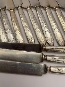 Antique WM. A. Rogers. 12 DWT Warranted Silver Plated Dinner Knives. Set of 12. - Picture 1 of 3