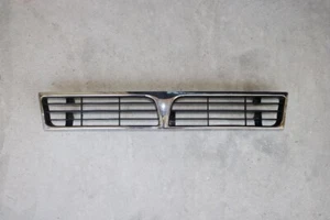 GRILECHROME BLACK.91-92 MITSUBISHI MIRAGE 3/4DR SEDAN 2DR HATCHBACK - Picture 1 of 2