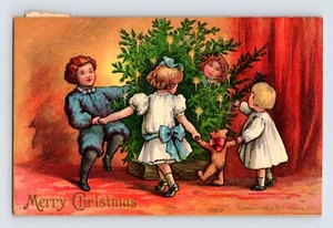 Postcard Christmas Children Teddy Bear Dance Tree Candles 1909 Posted Divided - Picture 1 of 2