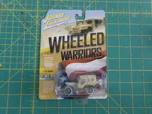 New in Package Johnny Lightning Wheeled Warriors Jeep with Snow 1/64 - Picture 1 of 1
