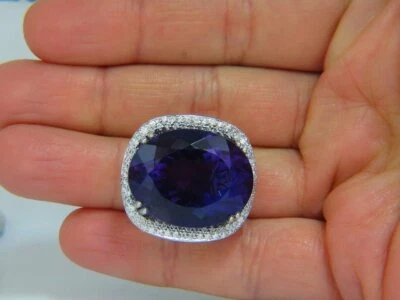 Anillo redondo de circonita cúbica de piedra transparente y claridad ovalada de amatista de 40,12 quilates de corte ovalado de 1,08 quilates Foto 1 de 4