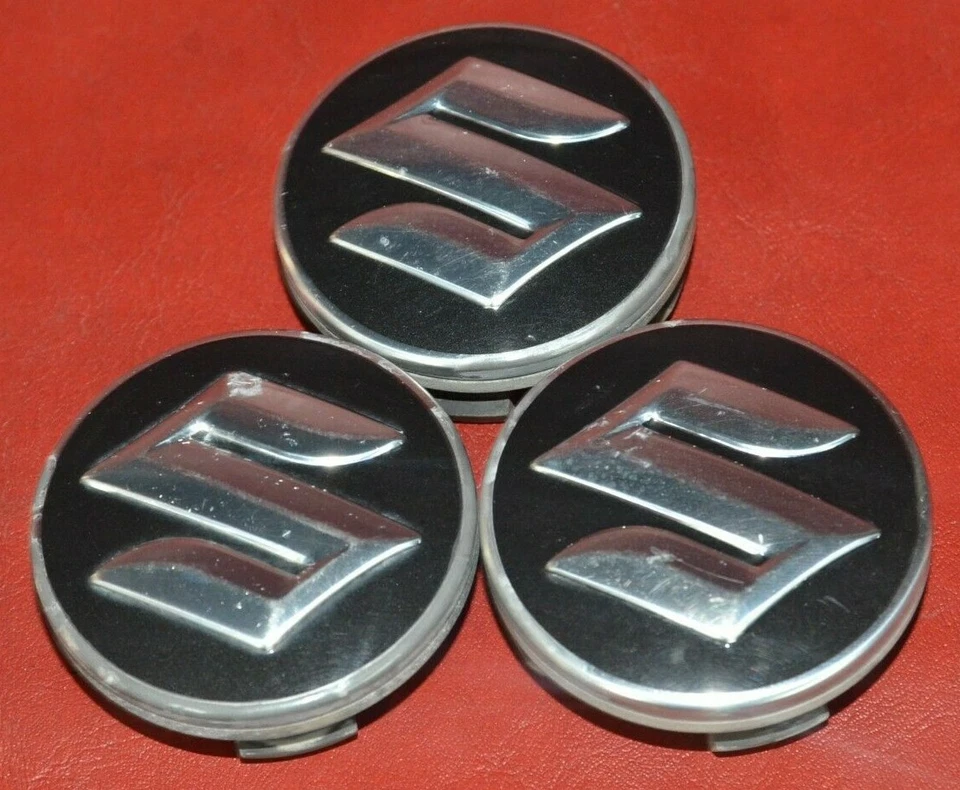 2004-2006 Suzuki Forenza Reno Center Caps 96452329 Set of THREE Hubcaps - Image 1 of 4