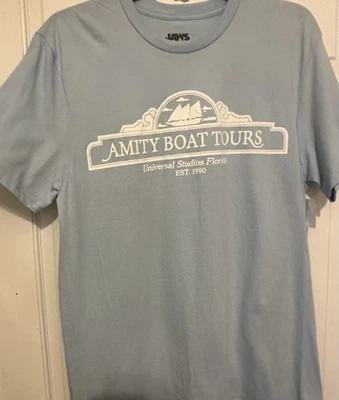 NUEVA Camiseta Universal Studios Florida 🦈Amity Boat Tours Azul Hielo •Adulto Mediana Foto 1 de 4