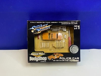 2001 ERTL 1/64 SCALE SMOKEY AND THE BANDIT POLICE CAR MODEL KIT/ACTIVITY SET - Image 1 of 4