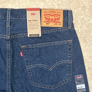 Pantalones de mezclilla Levi's 502 para hombre 36x32 azul cónicos elásticos lavado medio flexible ecológico - Imagen 1 de 9