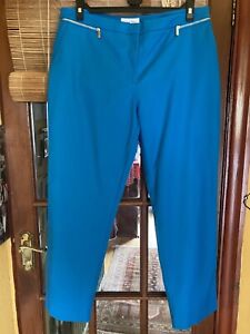 TURQUOISE BLUE “CALVIN KLEIN” TROUSERS SIZE 10..