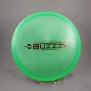 New Discraft 20th Anniversary Wasp Tooled Z Buzzz 177+g Gold Reflective Stamp - Picture 1 of 2